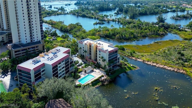 drone / aerial view with a water view