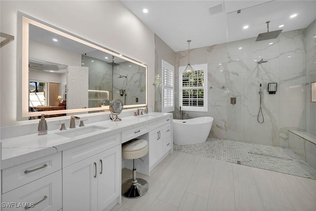 bathroom with vanity and plus walk in shower