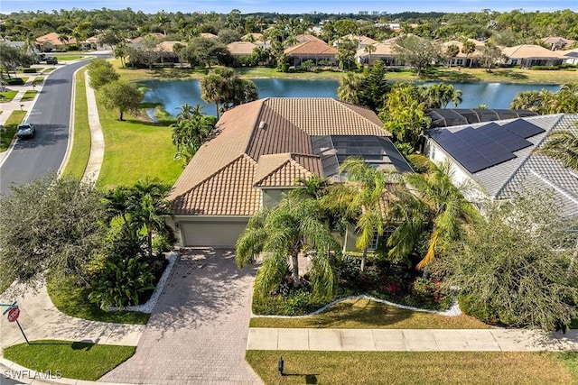 drone / aerial view with a water view