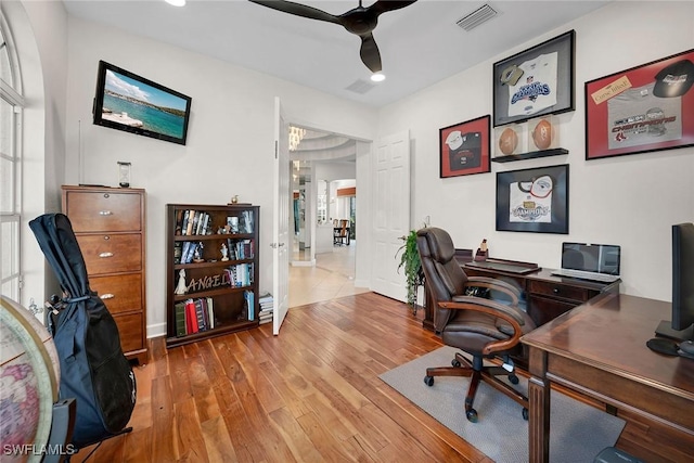 office space with light wood-type flooring