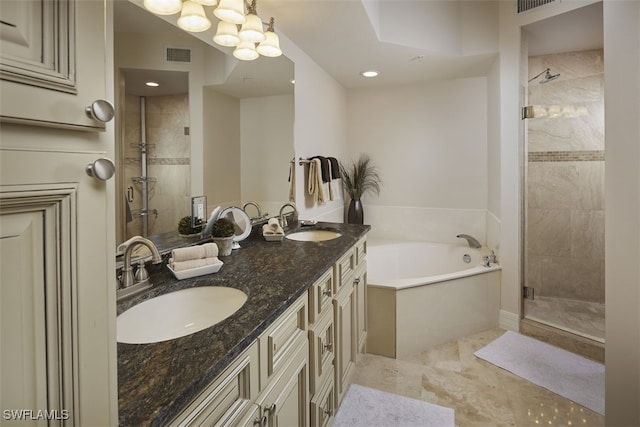 bathroom featuring tile patterned floors, vanity, and plus walk in shower