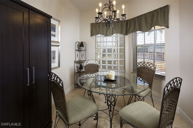 dining area with a notable chandelier