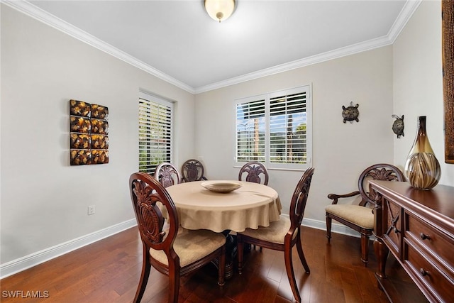 dining space with dark wood-type flooring and ornamental molding