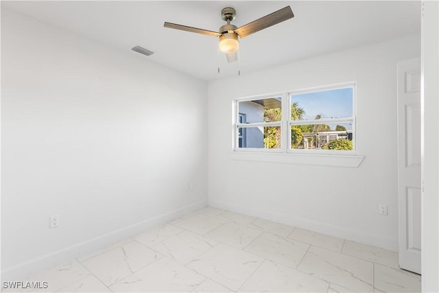 unfurnished room featuring ceiling fan