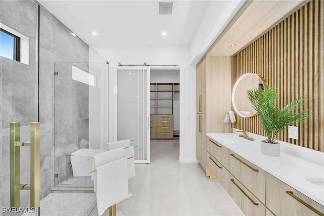 bathroom with vanity, an enclosed shower, and toilet