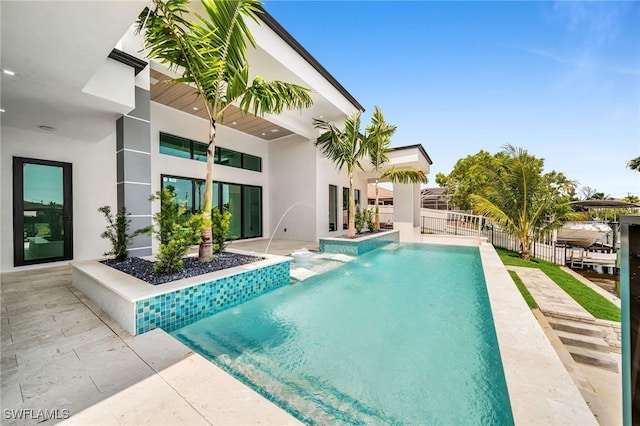 view of pool featuring pool water feature