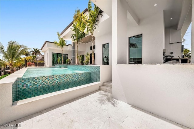 view of swimming pool featuring pool water feature