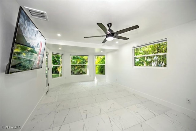 unfurnished room with ceiling fan