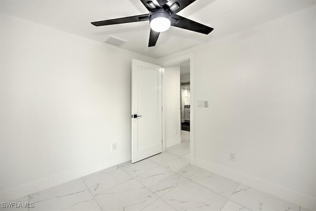 spare room featuring ceiling fan