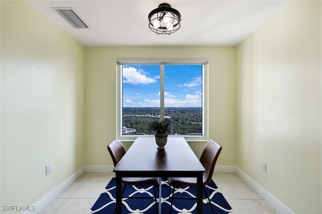 dining room with light tile patterned floors