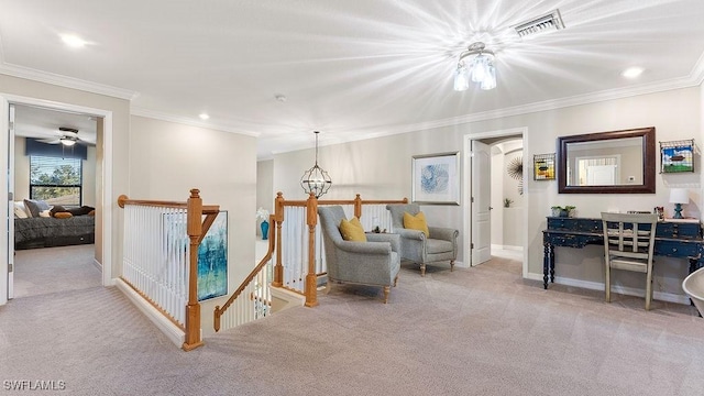 living area featuring light carpet, ornamental molding, and a notable chandelier