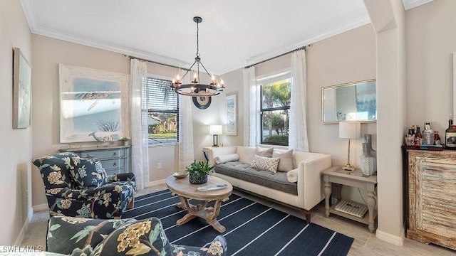 sitting room with crown molding, a chandelier, and light wood-type flooring