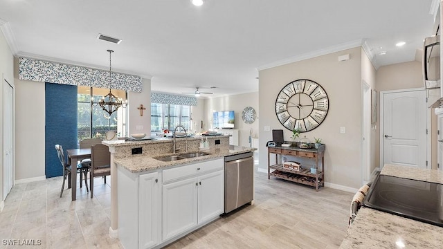 kitchen featuring white cabinets, sink, stainless steel dishwasher, an island with sink, and decorative light fixtures