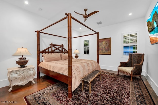 bedroom with hardwood / wood-style flooring and ceiling fan