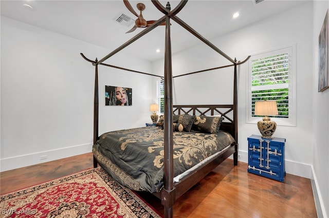 bedroom featuring hardwood / wood-style floors