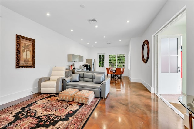 living room with concrete floors