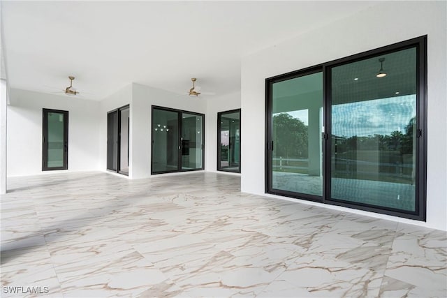 view of patio / terrace with ceiling fan