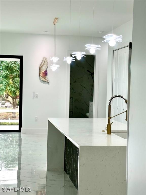 kitchen with sink and hanging light fixtures