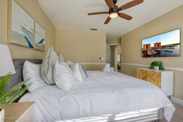 carpeted bedroom featuring ceiling fan