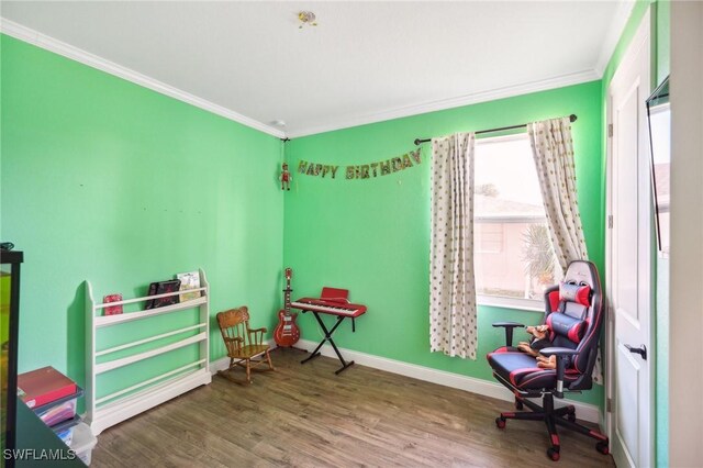 sitting room featuring crown molding and wood-type flooring