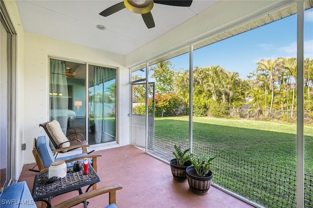 sunroom / solarium with ceiling fan