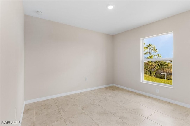 empty room featuring light tile patterned flooring