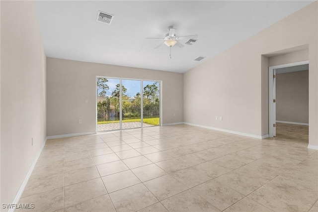 empty room featuring light tile patterned floors and ceiling fan