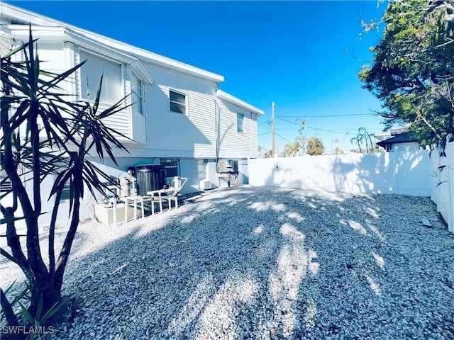 view of yard featuring central AC