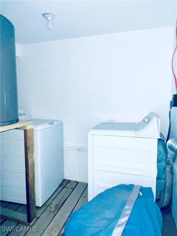 bedroom with separate washer and dryer