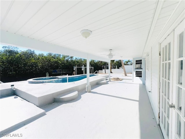 view of pool featuring a patio area and ceiling fan