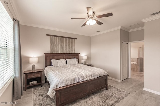 bedroom with ceiling fan and ornamental molding