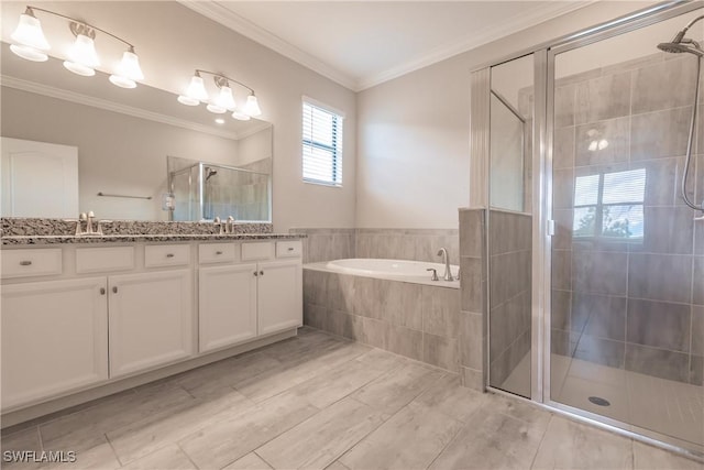 bathroom with separate shower and tub, tile patterned floors, vanity, and ornamental molding