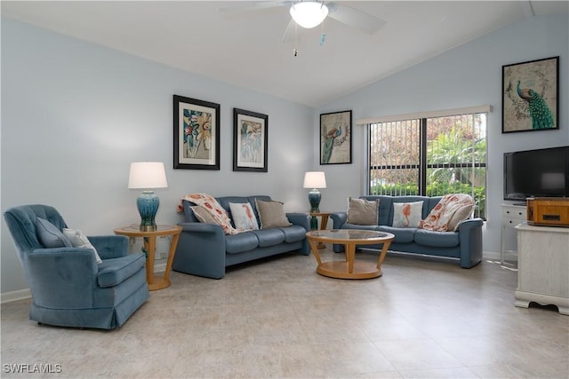 living room with ceiling fan and lofted ceiling