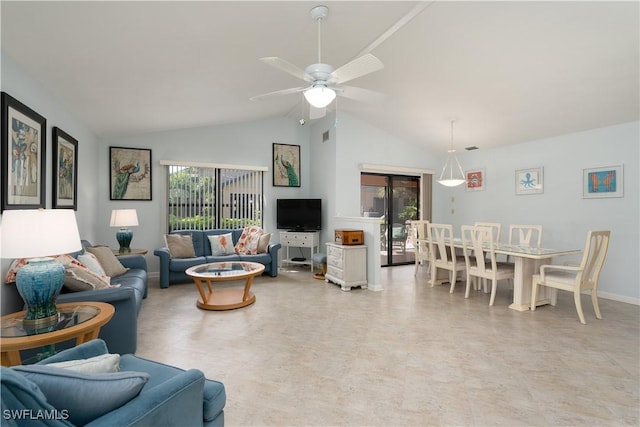 living room with ceiling fan and high vaulted ceiling