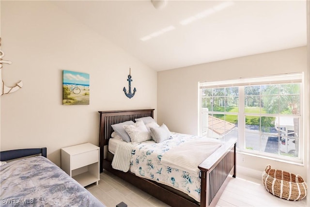 bedroom with vaulted ceiling