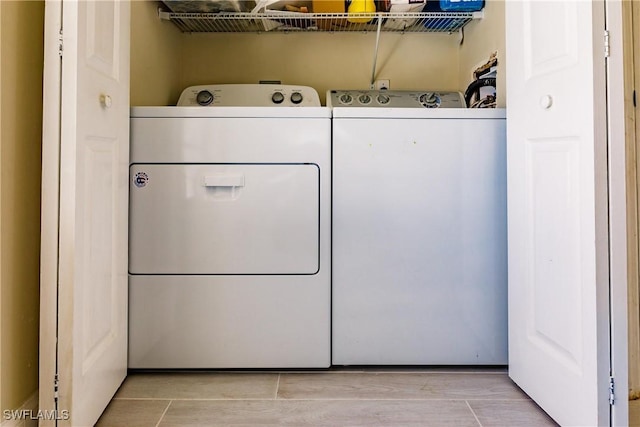 laundry area featuring independent washer and dryer