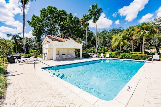 view of pool with a patio