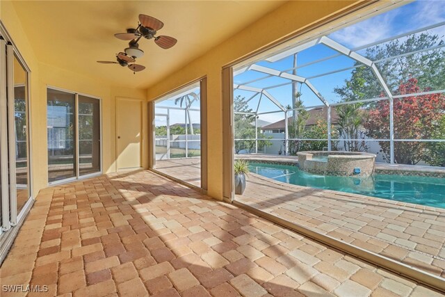 view of pool featuring ceiling fan