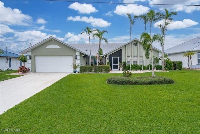 ranch-style home featuring a garage and a front yard