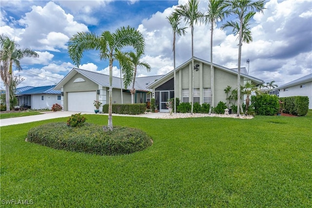 single story home featuring a front yard and a garage