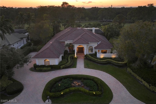 view of aerial view at dusk