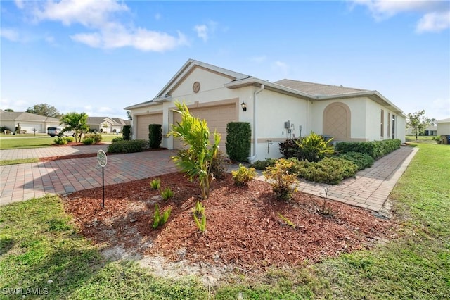 view of side of property with a garage