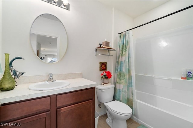 full bathroom featuring shower / bath combo, vanity, and toilet