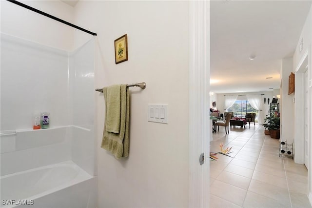 bathroom with tile patterned floors