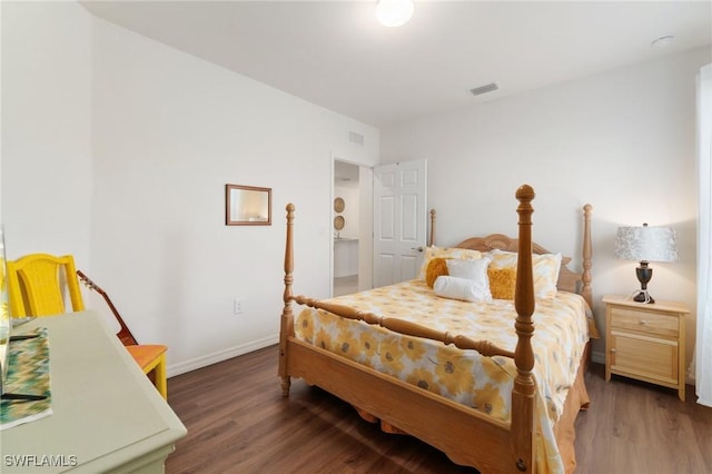 bedroom featuring dark hardwood / wood-style floors