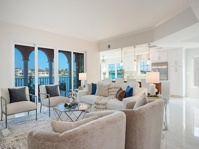 living room with ornamental molding