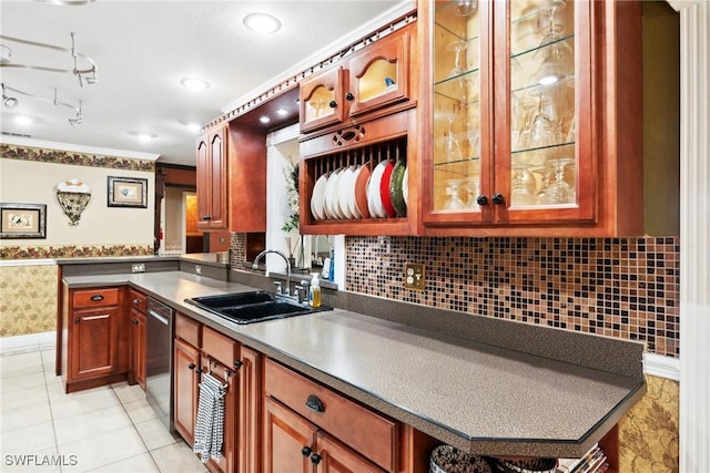 kitchen with sink, light tile patterned floors, ornamental molding, and dishwasher