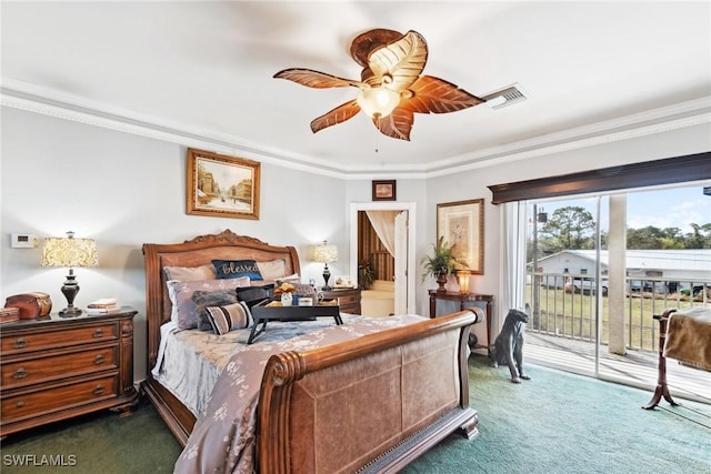 bedroom featuring dark colored carpet, crown molding, and access to outside