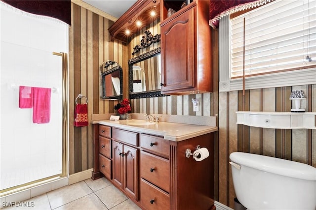 bathroom with vanity, tile patterned floors, and toilet