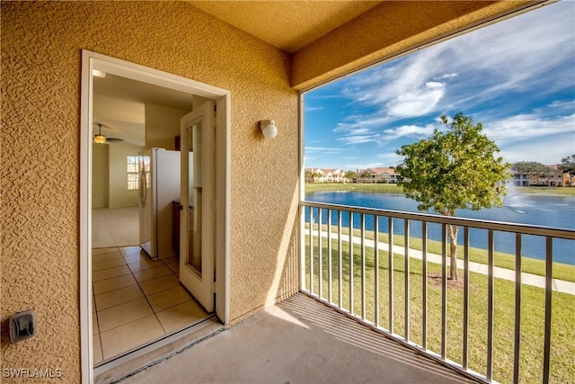 balcony featuring a water view